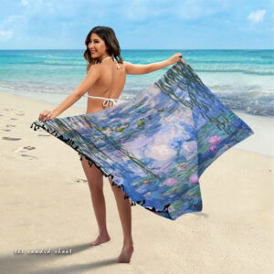 sarong photography, sarong poses, beach photography tips, dynamic sarong shots, best beach photoshoot ideas, sarong styling, movement photography, posing techniques for sarongs