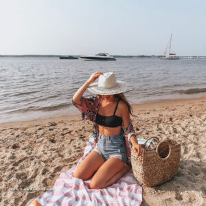 sarong photography, sarong poses, beach photography tips, dynamic sarong shots, best beach photoshoot ideas, sarong styling, movement photography, posing techniques for sarongs