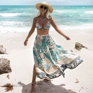 sarong photography, sarong poses, beach photography tips, dynamic sarong shots, best beach photoshoot ideas, sarong styling, movement photography, posing techniques for sarongs