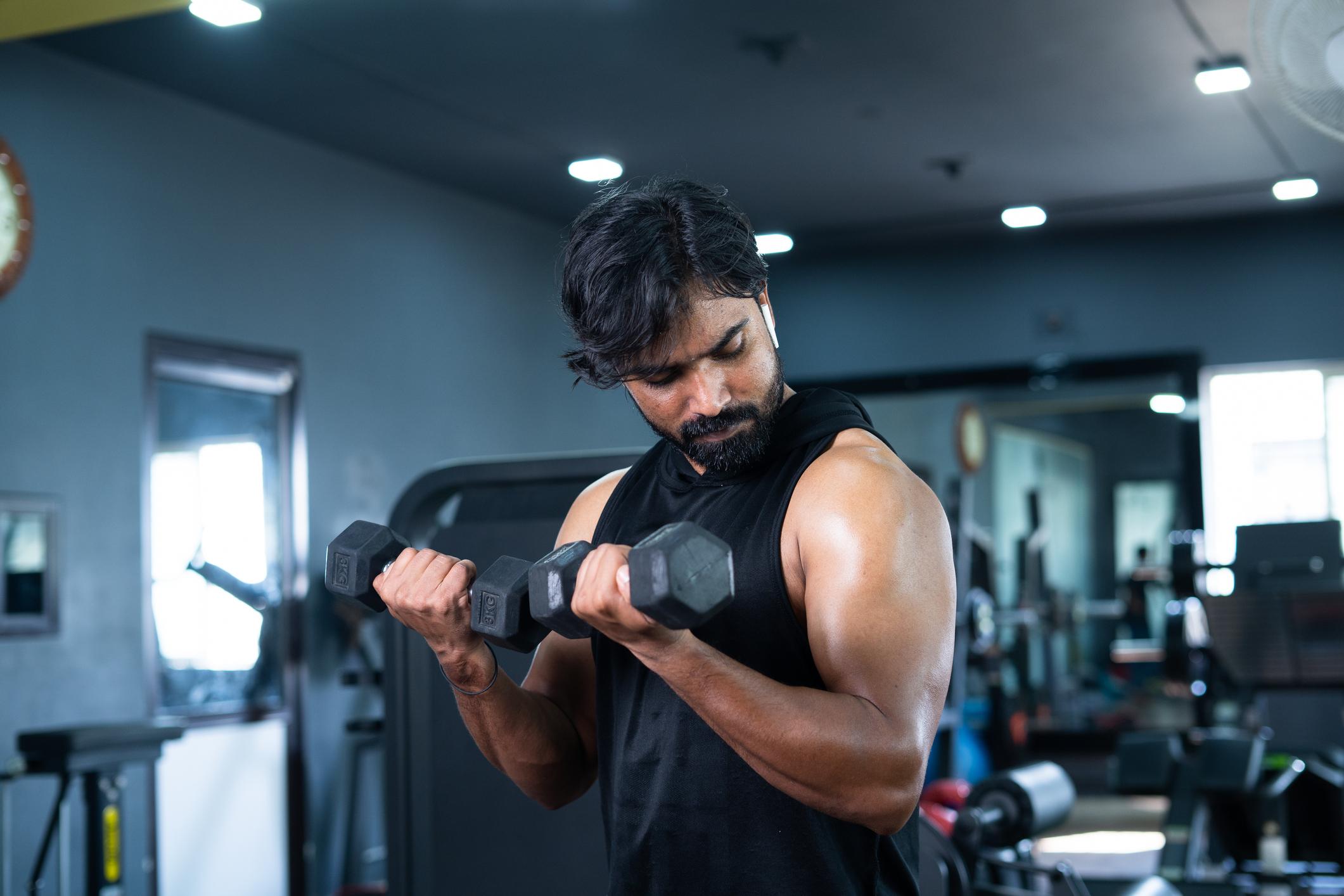 Dumbbell Curl Pose - best gym photography poses