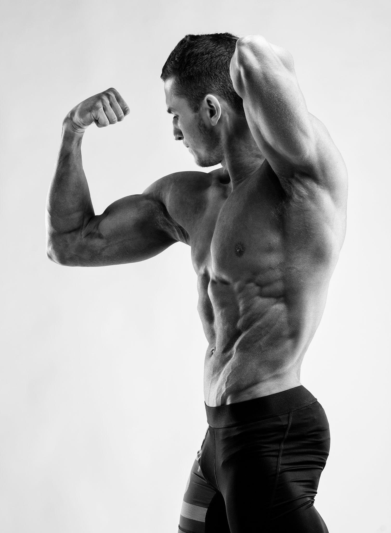 Hands Behind Head Pose - best gym photography poses